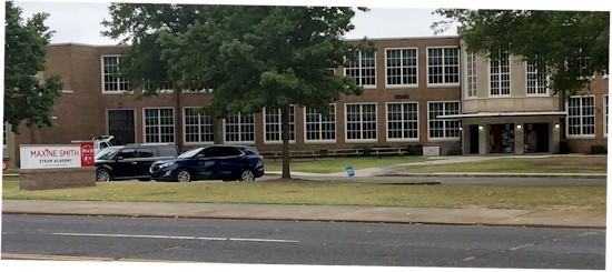 wider image to show location of new sign on campus